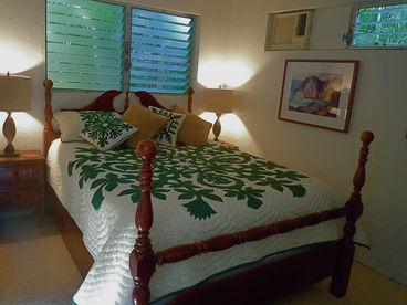 The cottage has a separate bedroom with a Queen bed, 8\' closet w/mirrored doors, storage shelfs, ceiling fan, as well an A.C. that services the bedroom.
