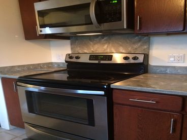 Coconut Corner Rental-Full Kitchen-Covered Patio-Split A/C-Close to Beach