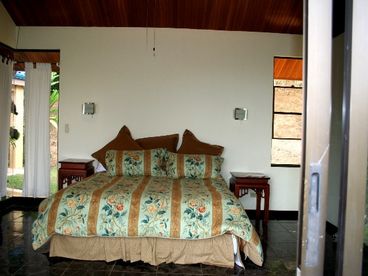 View of King bedroom from Pool area. All bedding purchased new 2007.
