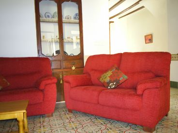 Sitting Area showing the traditional Valencian cupboard and the vaulted beamed ceilings.  
For more photos, click onto our website