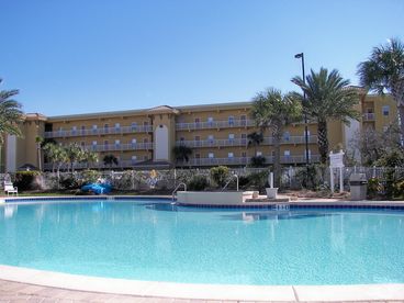 Beach Retreat condos from the back.  Notice the 3000 square foot pool!  There is also a hot tub and a fitness center!