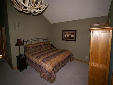 Master Bedroom - King size bed, tv, patio, bathroom w Jacuzzi tub. 
