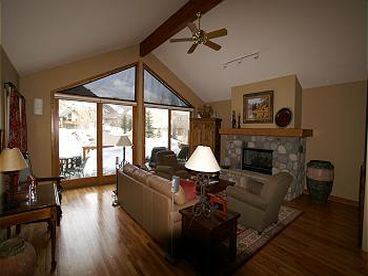 Living Room with TV, DVD, Stereo, and fireplace. Floor to ceiling windows. Great views of Gore Range.  