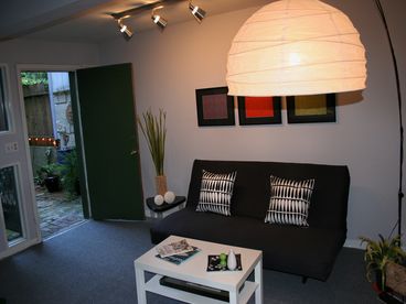 Bright living room looking onto garden