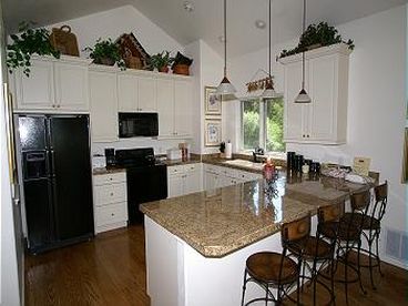 Kitchen - Great kitchen with all the creature comforts. Counter seating for 4. 