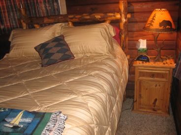 Queen log bed in each bedroom