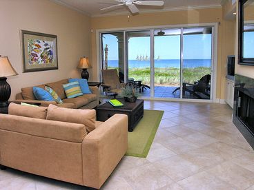 Spacious living room opens to large oceanfron patio!;