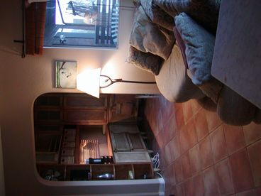 2nd bedroom, view to couch and office nook.