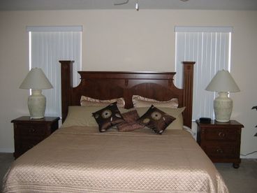 Huge king size bed, with seating area to side.