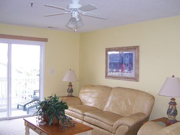 Living room with leather sofa and love seat