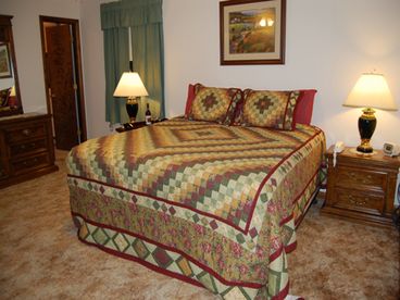 Master bedroom features a king bed with a plush pillow top mattress, large closet, and full private bath