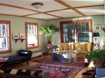 very Large sunny living room with windows on 3 walls-wonderful views of cove