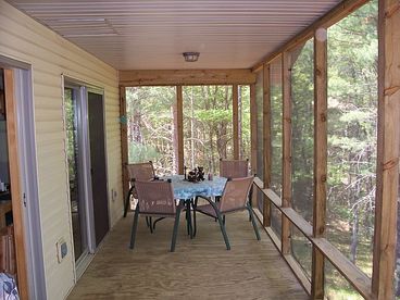 8 X 24 Screen Porch, great for 3 meals daily or anytime relaxation.  Deer watching, wild turkey watching and sometimes a black bear!