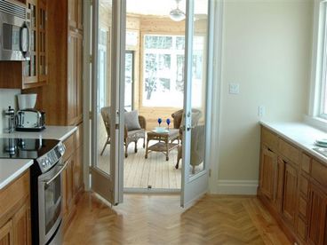view of 3 season porch off kitchen