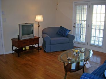 Living area with french doors leading to your private balcony!