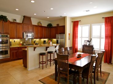 Spacious Gourmet Kitchen with Granite Counters.