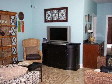 Family room with TV/DVD and game system.  A place for the kids to have their own space