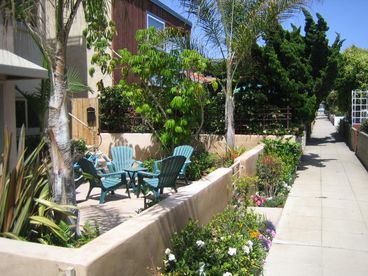 Ground level patio on courtyard to bay or ocean