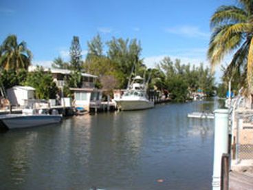 DOCK LEADING STRAIGHT OUT TO SNAKE CREEK WITH IMMEDIATE OCEAN AND BAY ACCESS