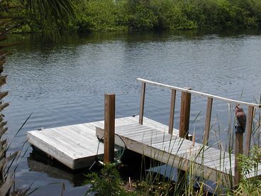 Floating dock below bridge