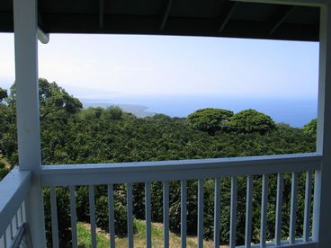 The peace and quiet of Kona Coffee country surrounds you.  Sit on the upper deck, enjoy a cup of Kona Coffee and enjoy the view over rolling coffee orchards to the Pacific Ocean beyond.