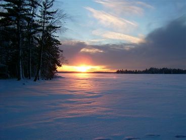 Wonderful winter evening. Looking south from where our dock would be in the summer. Perfect for snowmobiling, cross-country skiing, snow shoeing, and ice fishing - right off the front door of our cabin.