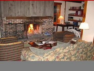 The large warm fireplace works well in all seasons.  Cool evenings in the summer invite a comfortable glass of wine and a late night snack in front of the fire.
