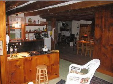 The kitchen was professionally renovated in the early 1970\'s with modern appliances that seem to work very well with the large functioning wood stove, still a place to bake an apple pie.