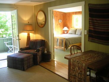 View of the open living room out to the lanai