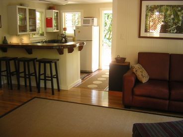 Open living room/ bar/ kitchen perfect for easy entertaining