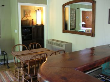 Bar and dining table to Stereo cabinet with Quality stereo, CD player and ipod port and charger. Lots of games & puzzles