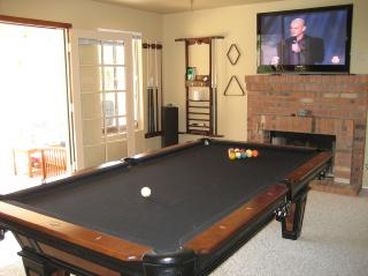 Top of the line Connelly Pool Table! Premium cue sticks, Aramith balls, upgraded felt, 8 foot table. Amazing! 60: Plasma TV above the fireplace!!!