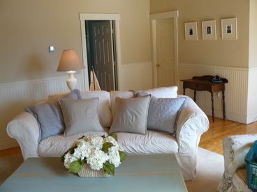 Sitting area with open area to bedrooms and full bath.