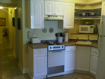 The remodeled kitchen is supplied with just about everything you\'ll need while you\'re here. 