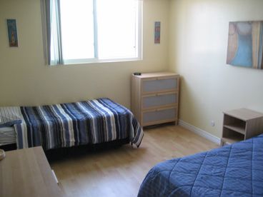 Second Bedroom - 2 twins (with 3rd, roll-away bed underneath)