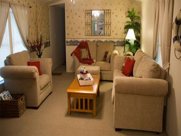 Cabin Living Room includes Board Games, Hide-a-Bed Couch, Love Seat, and other Furniture.