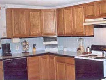 The large kitchen is fully equipped with all of your cooking and serving needs.