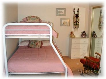 Guest Bedroom with bunk bed. Walkout to deck. -St. George Condo Rental
