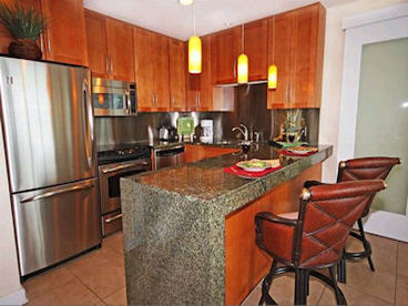 Luxury kitchen with GE profile appliances. View of the ocean while you cook.