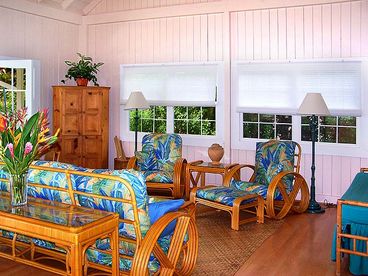 The spacious living room is decorated in contemporary island style.