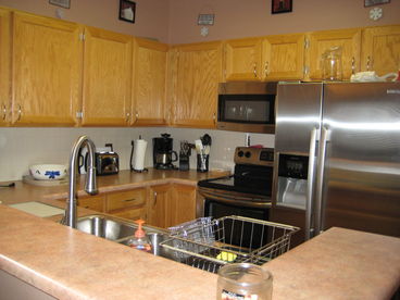 Kitchen with updated appliances fully equipped for those who like to cook.