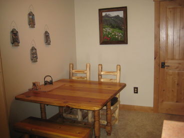 Separate dining area - Colorado Log style furniture.