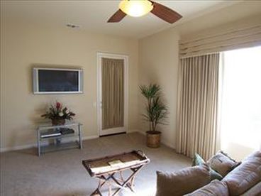 Master Bedroom  Seating Area with Wall Mounted TV