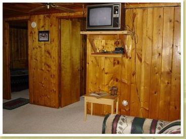 Comfortable sitting area with TV and DVD player.