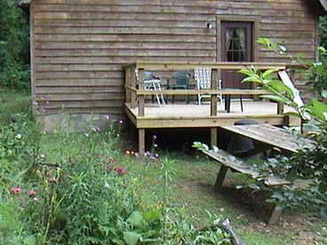 Woodhaven back deck offers a nice place to enjoy the woods; take a cup of coffee out on the deck and hear the birds as the world awakens.