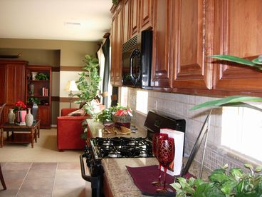Kitchen area and view of family room