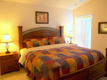 King Master Bed Room suite.  Dresser with large mirror.  Cable TV and bath room.  Free local & long distance calls (US & Canada).