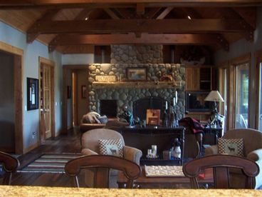 30 ft. river rock fireplace is only one of the great features in this room.  Every window has a veiw of the Deschutes River,  
