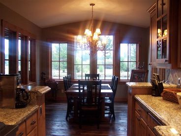 Dining room table seats 10, and the 16 ft. granite island seats 4 more.  For an entertainers delight