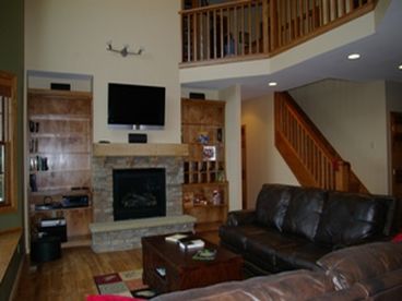2 leather couches in living, rocking love seat, 42\